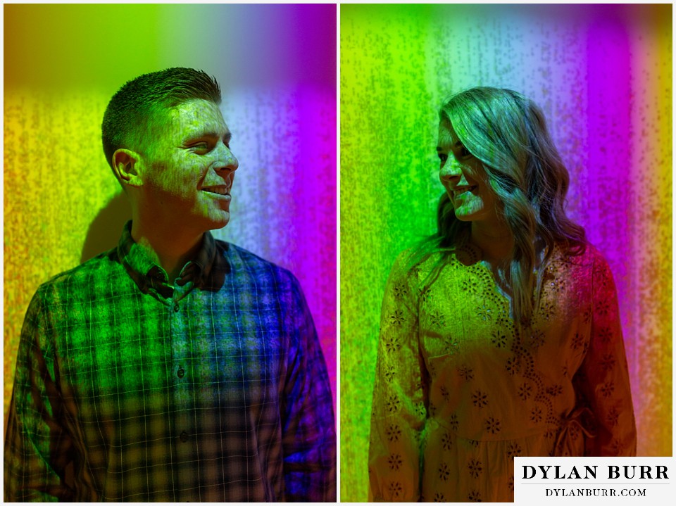 denver engagement photos dairy block downtown denver looking at each other with large color banding