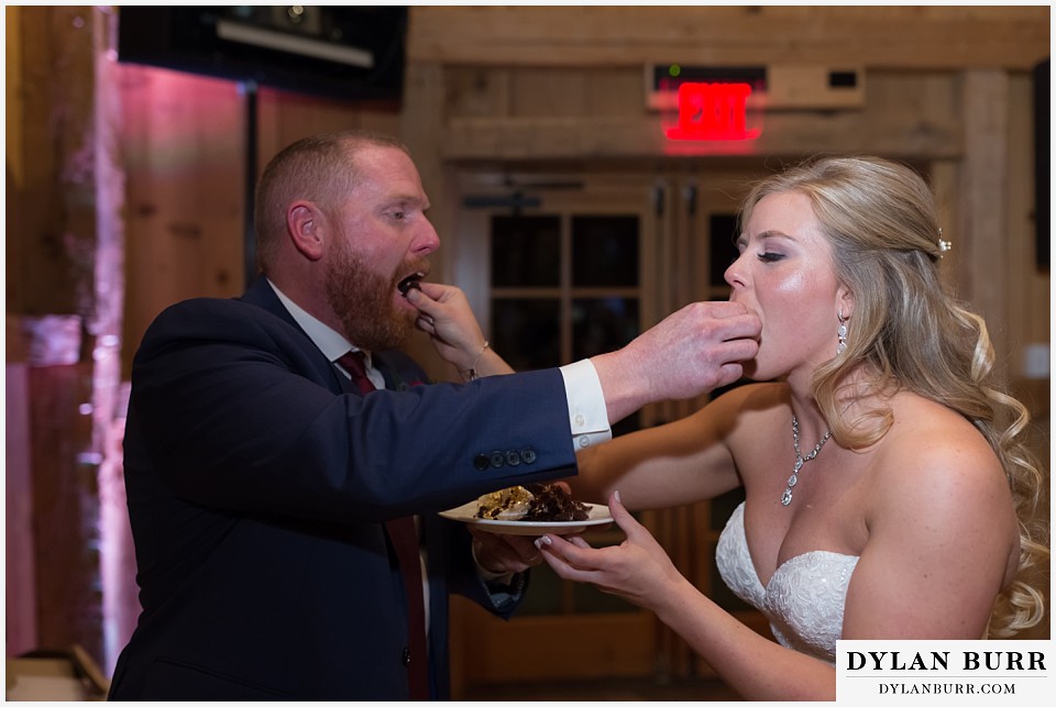 devils thumb ranch wedding in winter cake cutting