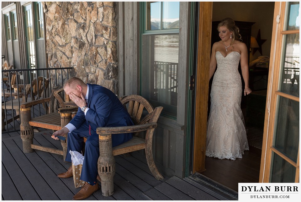 devils thumb ranch wedding in winter first look bride watching