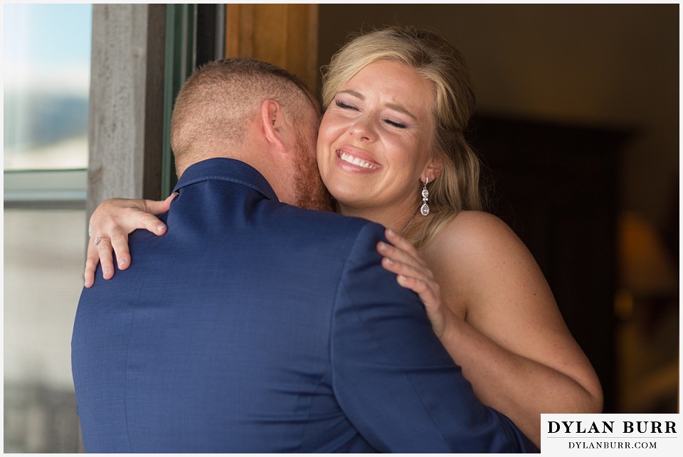 devils thumb ranch wedding in winter first look happy