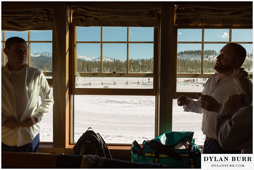 devils thumb ranch wedding in winter groomsmen getting ready lodge cabin