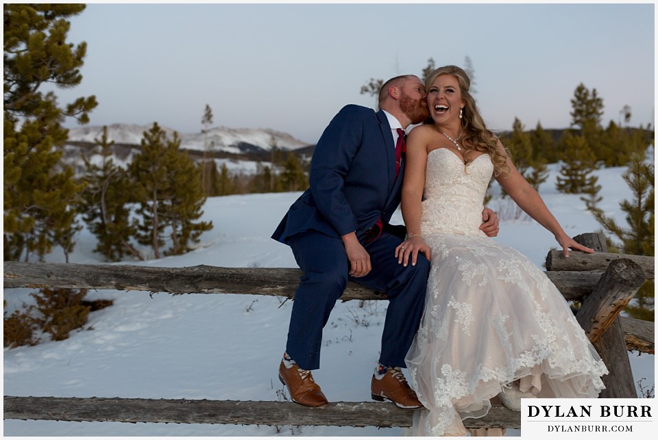 devils thumb ranch wedding in winter newlyweds having fun