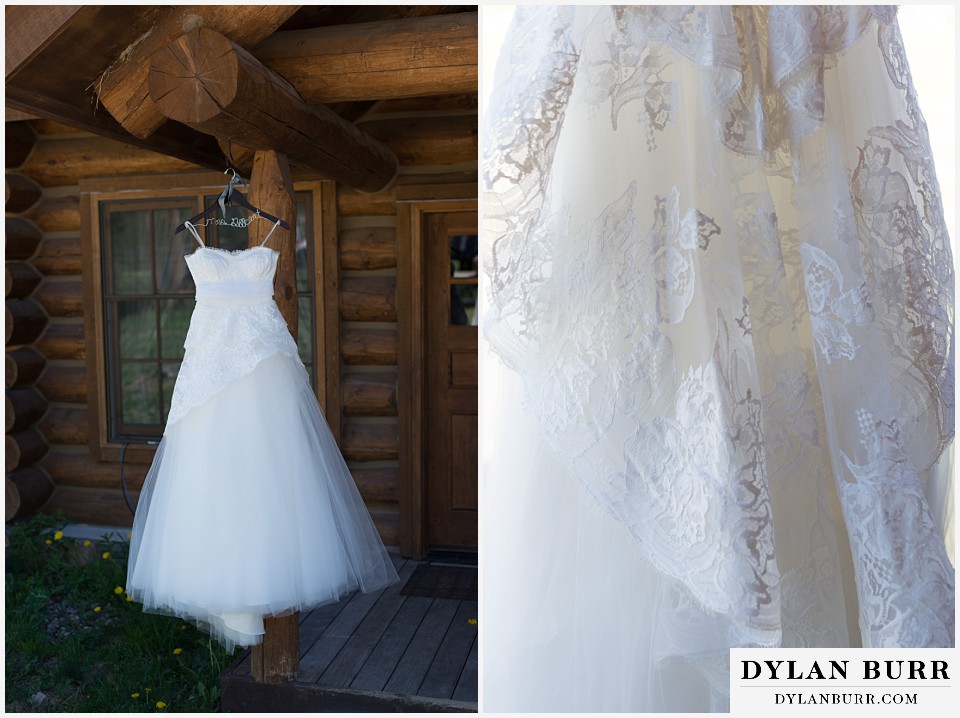 devils thumb ranch wedding brides dress hanging outside cabin