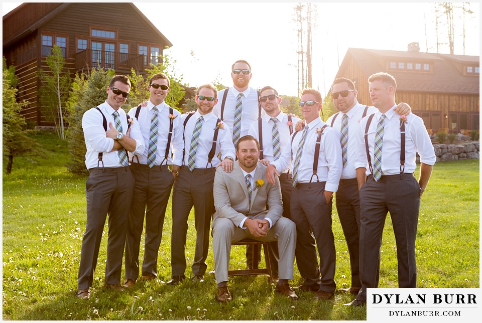 devils thumb ranch wedding groom and groomsmen at sunset