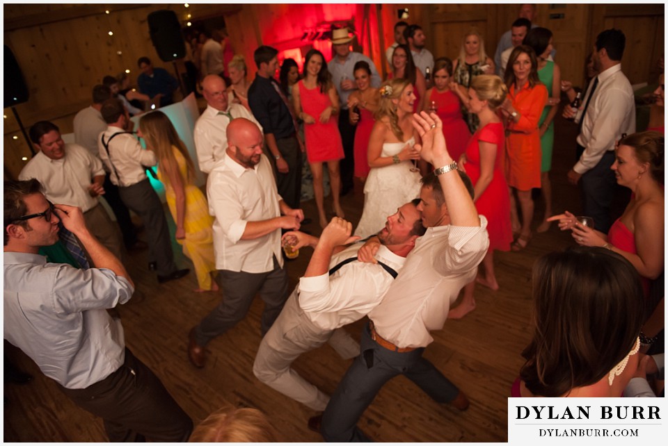 devils thumb ranch wedding groom dancing with his friends