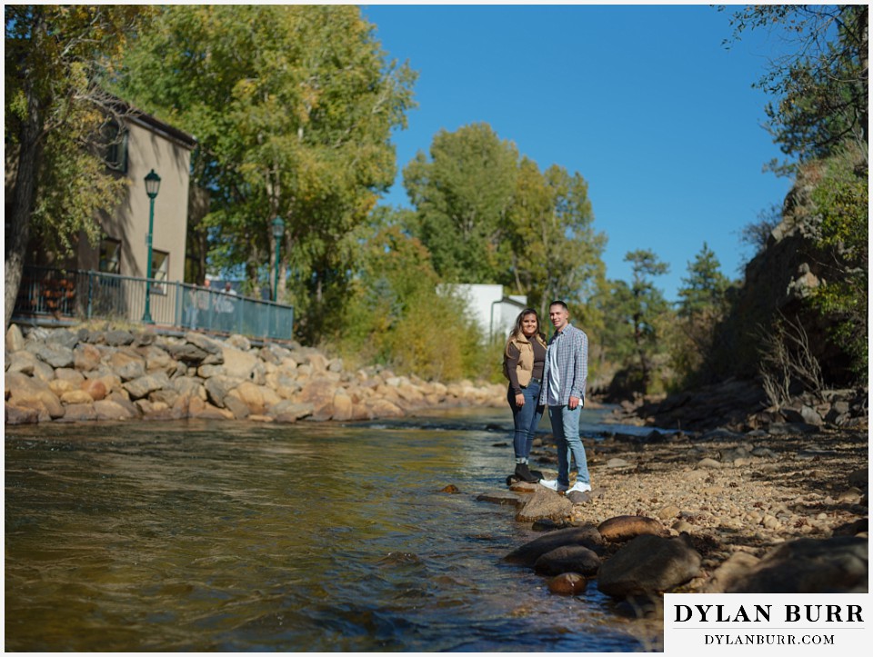 downtown estes park engagement photos by the thompson river