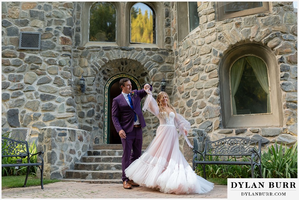 dunafon castle wedding couple dancing out front