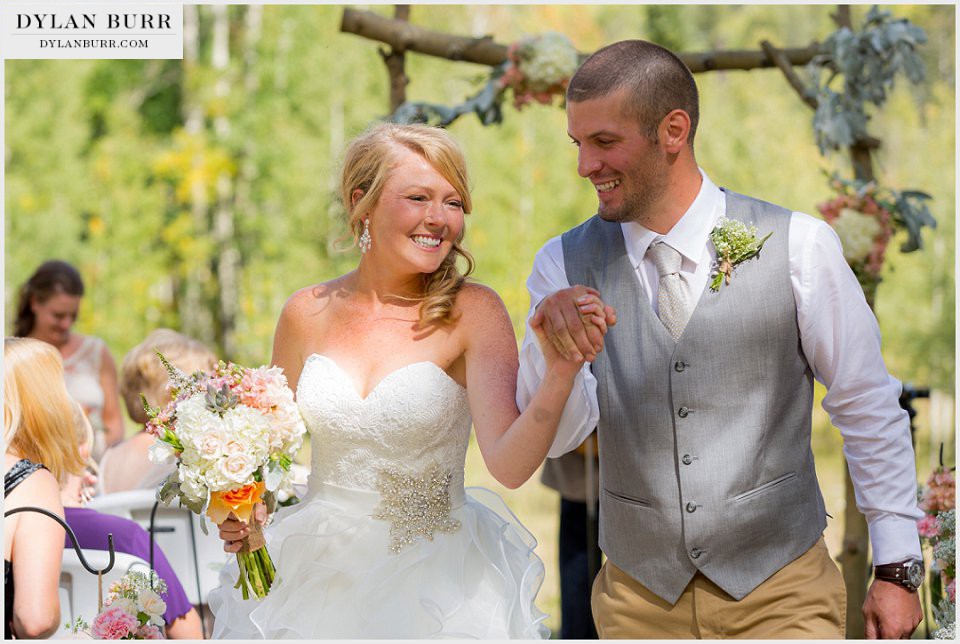 durango wedding photographer newlyweds ceremony aisle