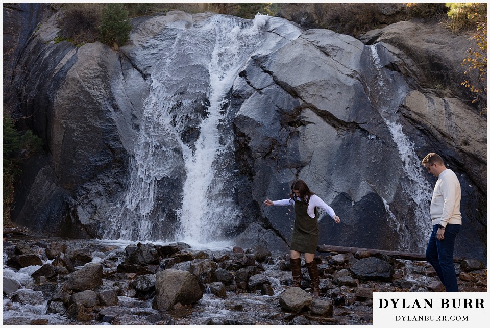 engagement photos at helen hunt falls colorado springs walking up to falls