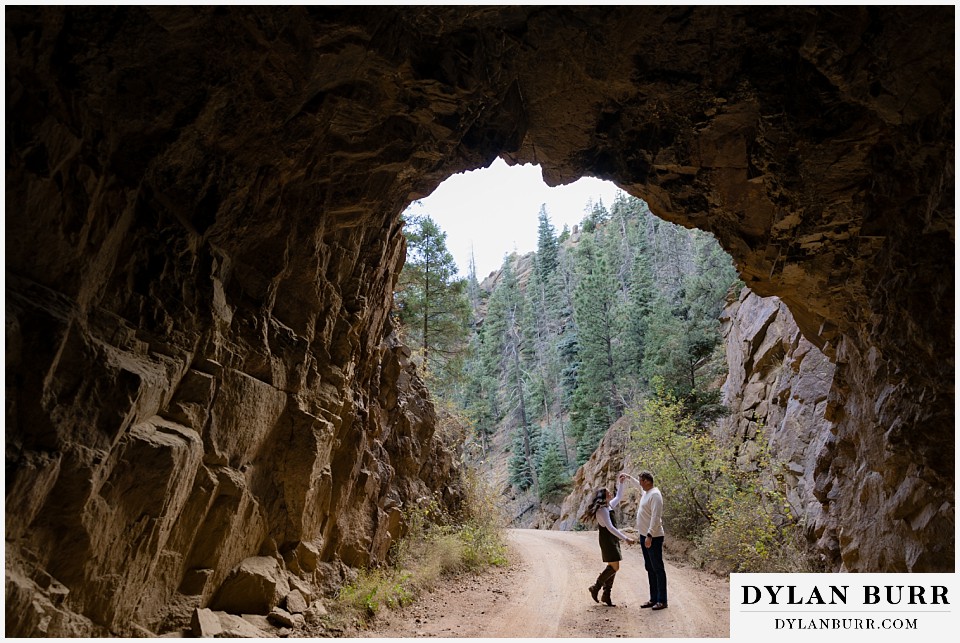 engagement photos at helen hunt falls colorado springs dancing in old mining tunnel