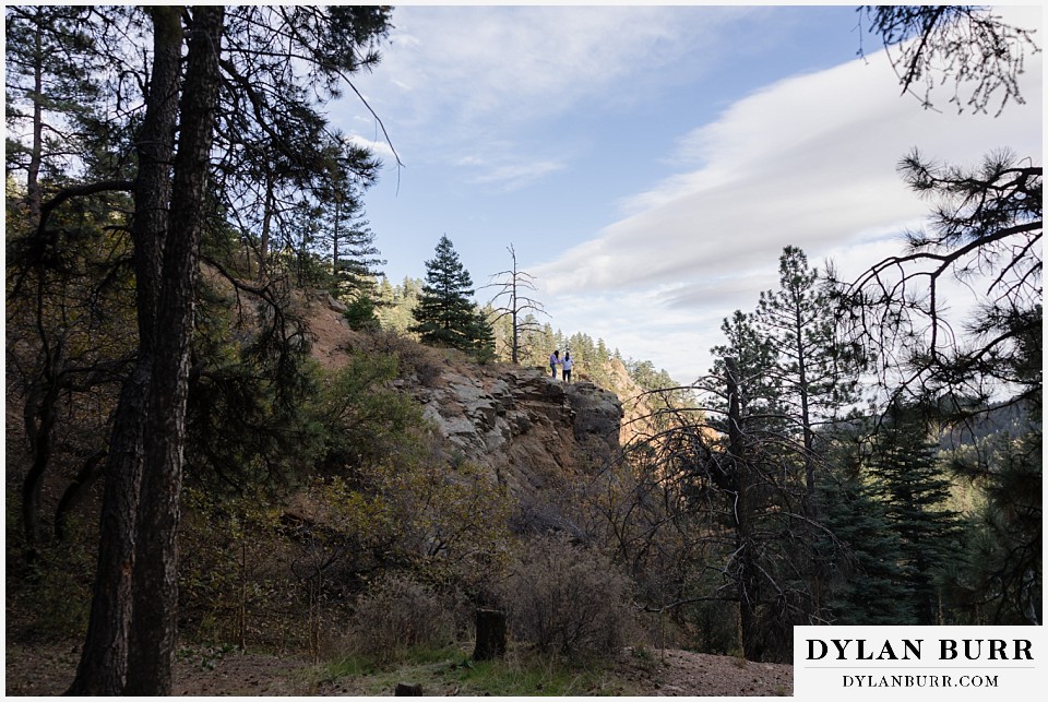 engagement photos at helen hunt falls colorado springs way off on a mountain peak