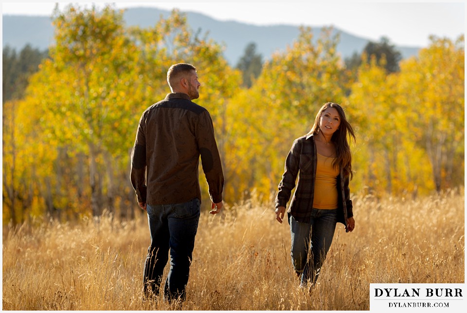 engagement photos golden colorado photographer couple exploring mountain meadow