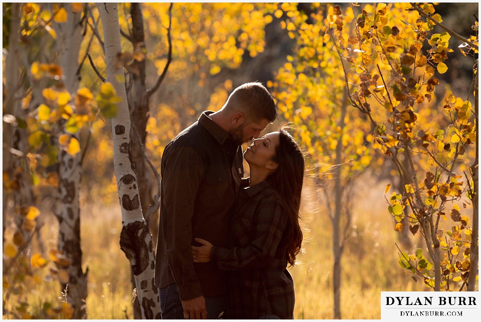 engagement photos golden colorado photographer fall in colorado mountains yellow aspen leaves