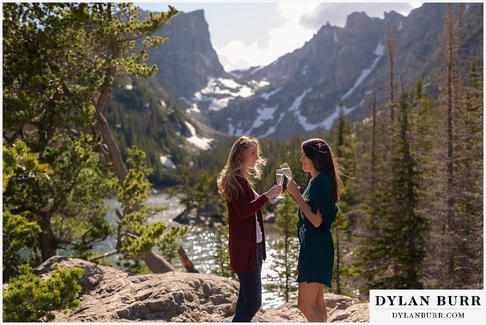 estes park engagement photos champagne toast