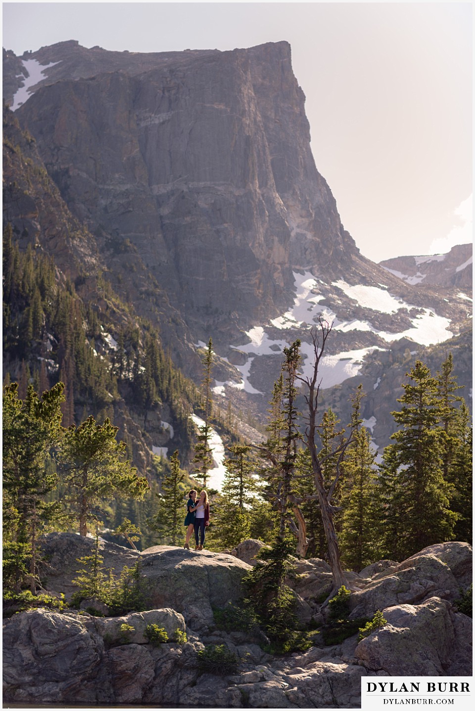 estes park engagement photos couple together at Hallett Peak