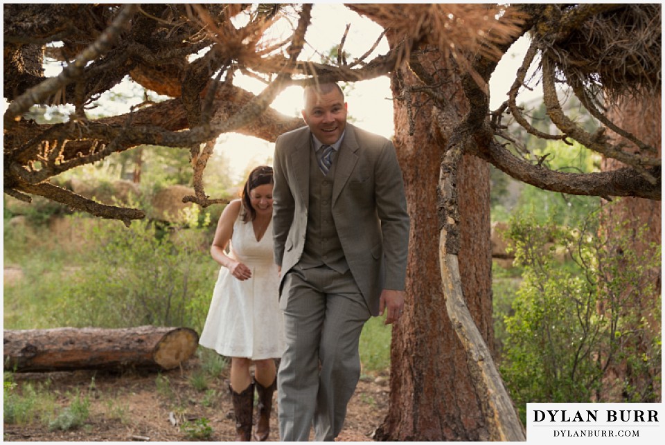 rocky mountain estes park engagement session exploring under giant pine tree