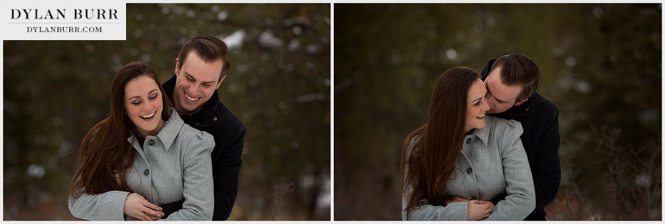 estes park engagement photos in winter hugging forest