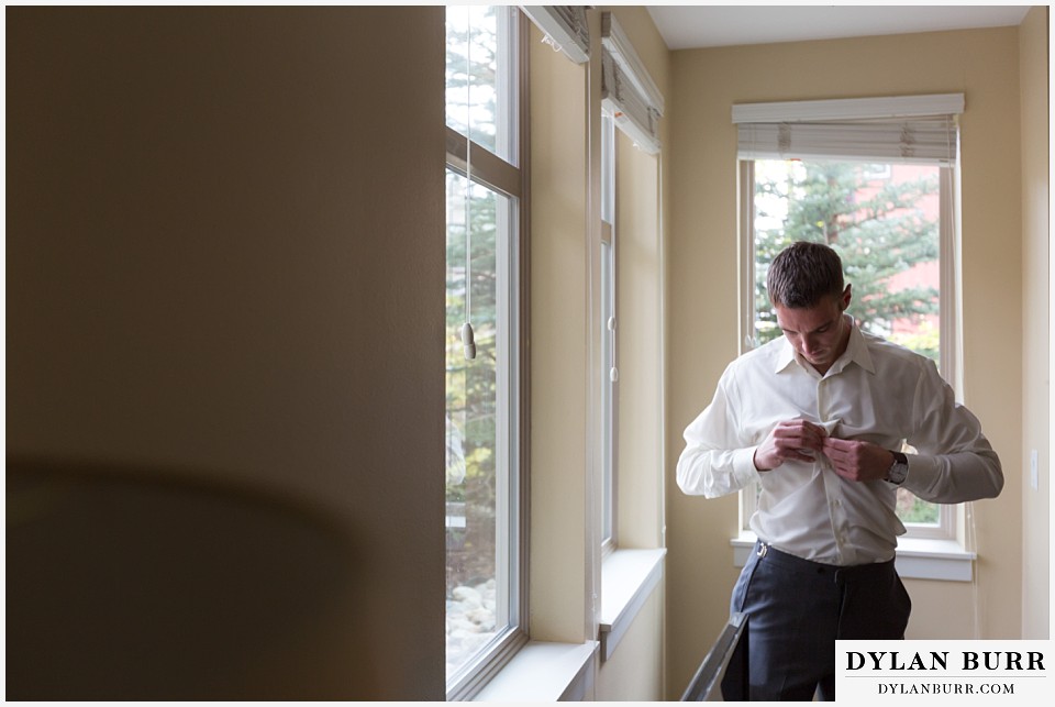 the lodge at sunspot wedding winter park groom getting ready