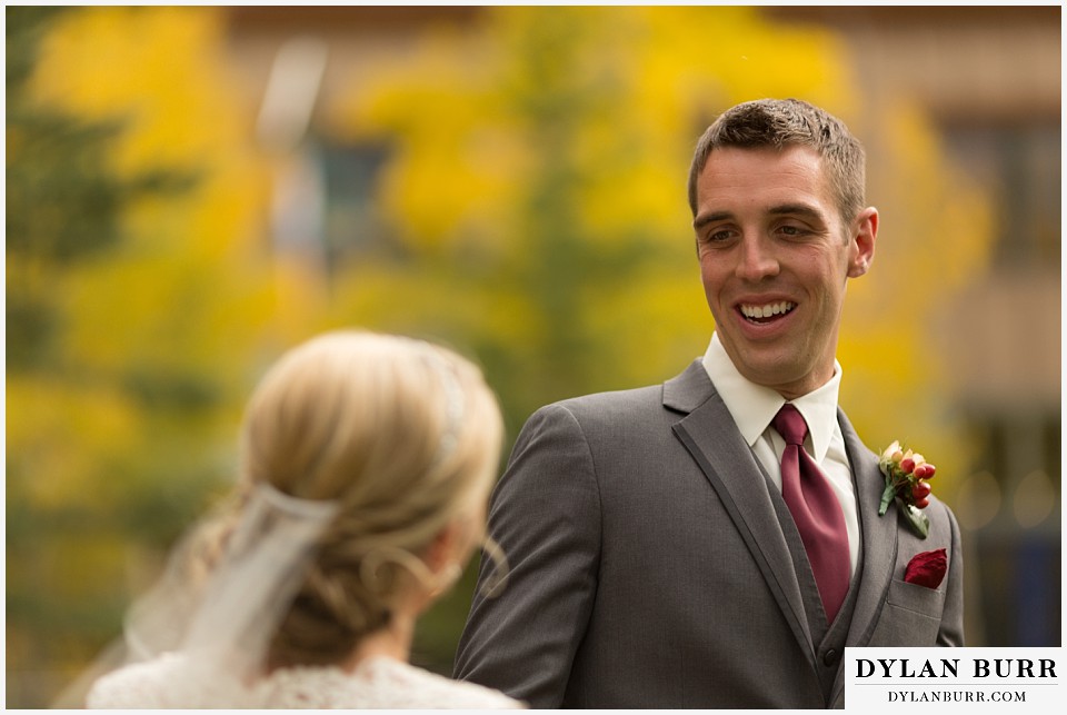 the lodge at sunspot wedding winter park groom at first look