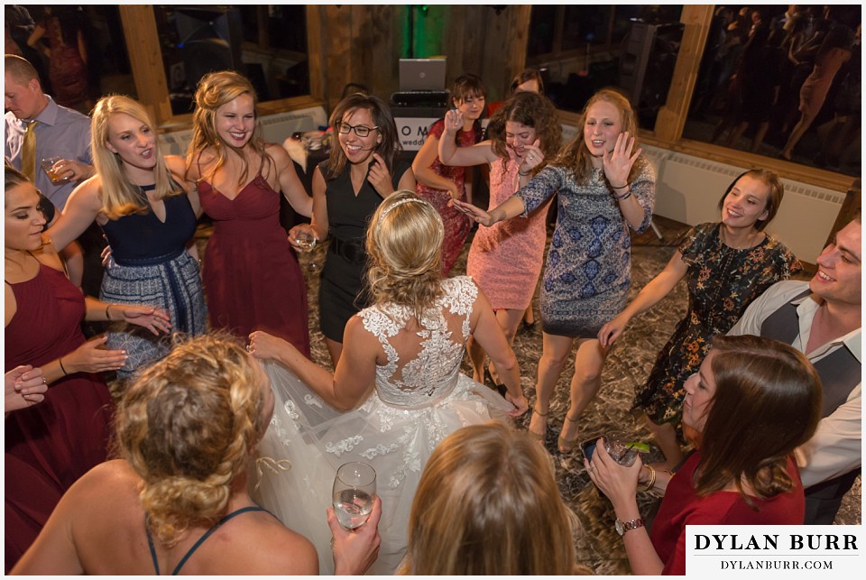 the lodge at sunspot wedding fall mountain wedding winter park reception party bride dancing with friends