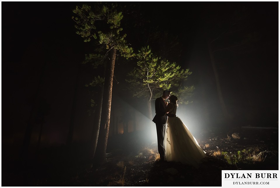 the lodge at sunspot wedding fall mountain wedding winter park couple night portraits in fog