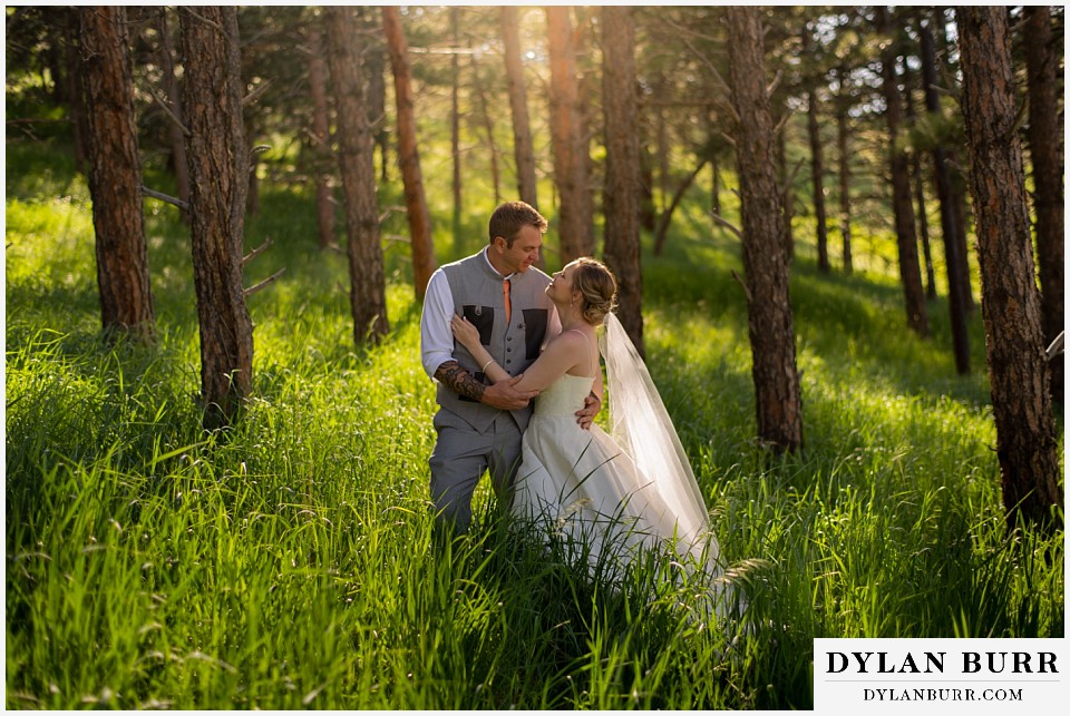 flagstaff house wedding boulder colorado bride and groom in pine trees