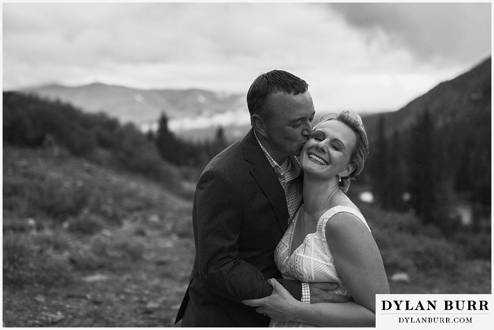 happy newlywed couple in mountains near breckenridge colorado elopement wedding