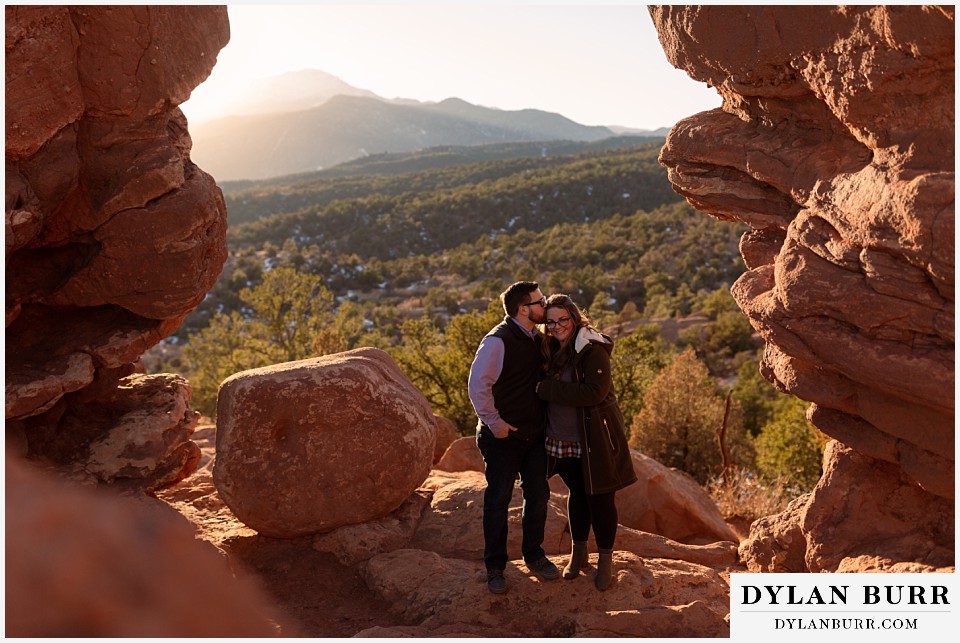 garden of the gods engagement session surrounded by large red rocks