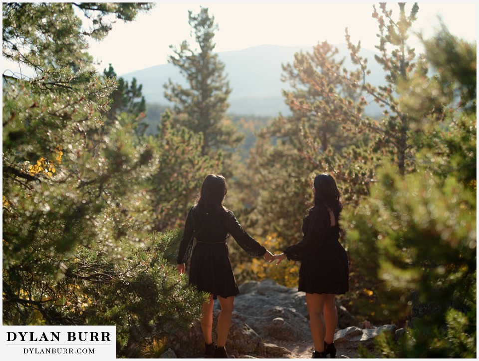 golden gate state park elopement wedding standing together on rock edge surrounded by trees