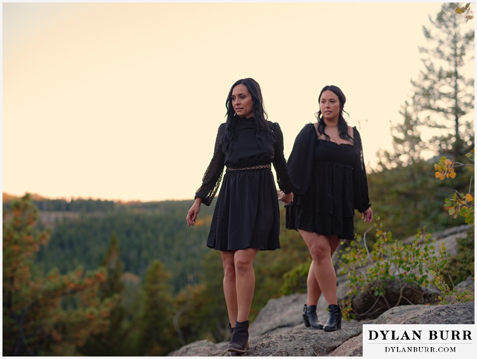 golden gate state park elopement wedding brides wearing black wedding dresses hiking down mountain
