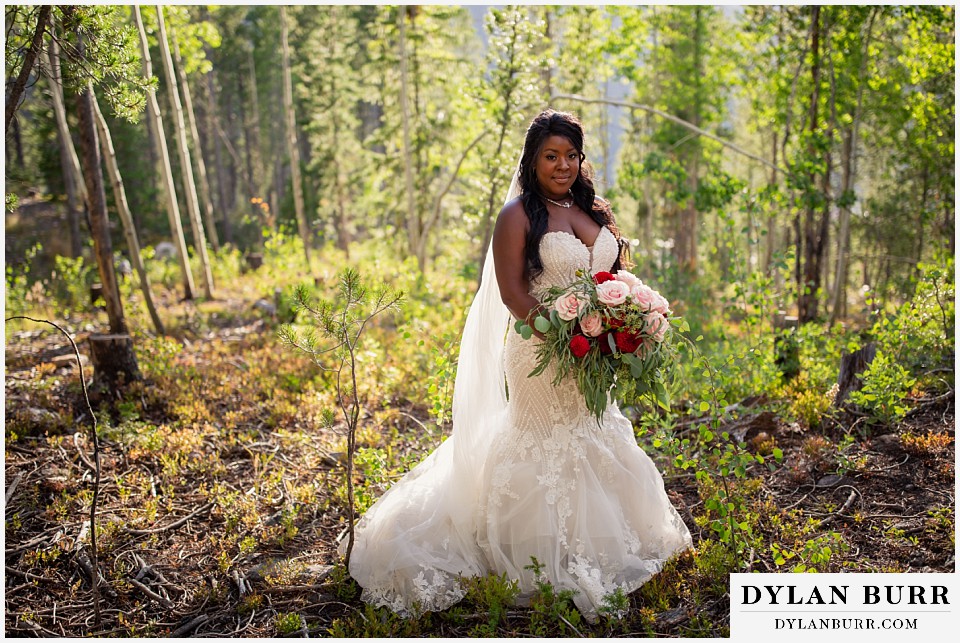 winter park mountain lodge wedding bride alone in forest