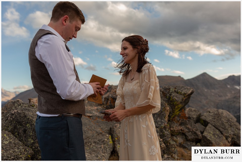 rocky mountain national park grand lake wedding elopement bride and groom reading vows