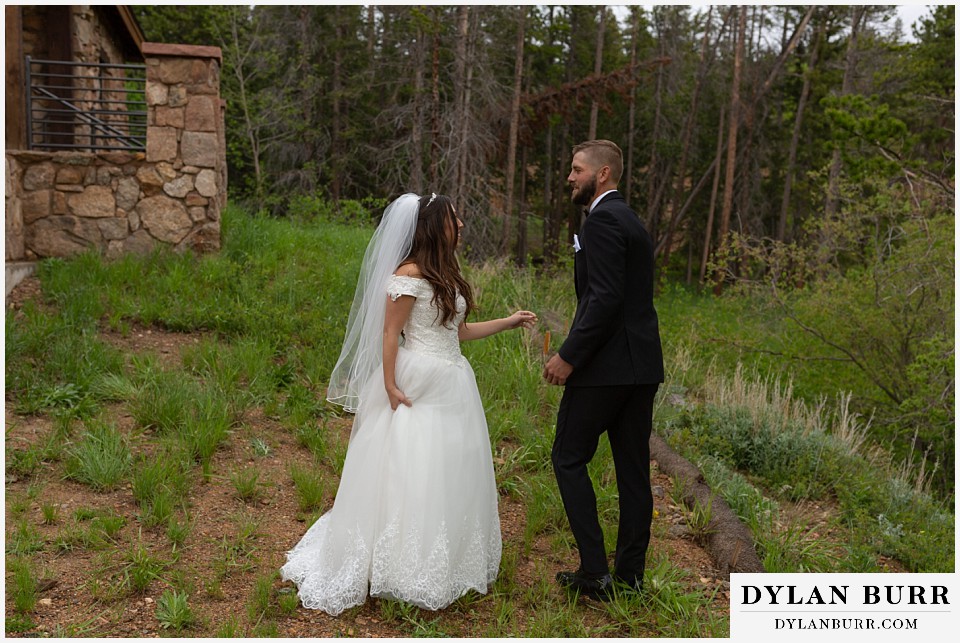 camp st malo wedding allenspark colorado estes park mountain wedding bride and groom first look