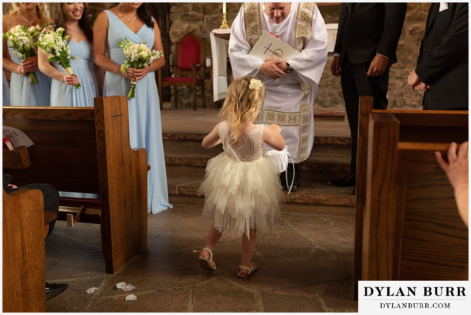 camp st malo wedding allenspark colorado estes park mountain wedding flower girl in aisle