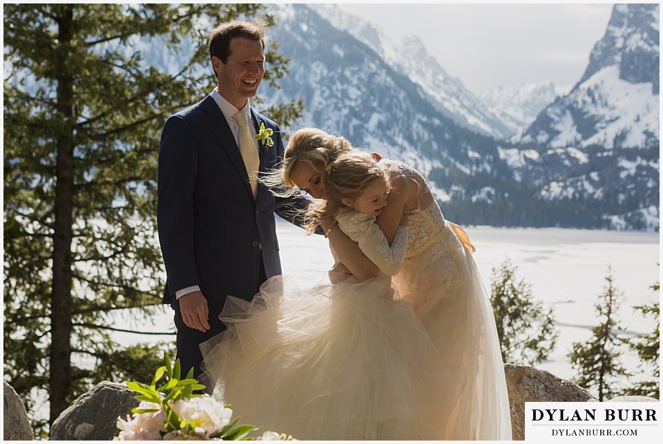 grand teton destination wedding ceremony hugs