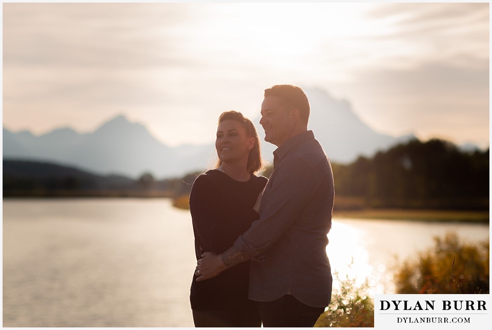 grand teton wedding anniversary photos couple looking down the river valley