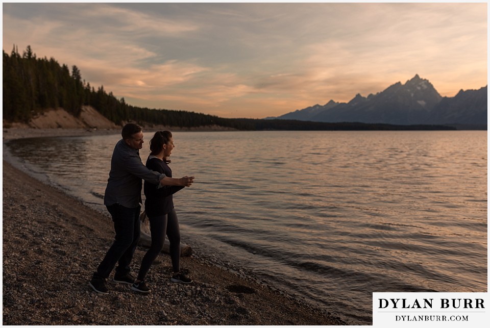 grand teton wedding anniversary photos couple he helps here with the arm motion