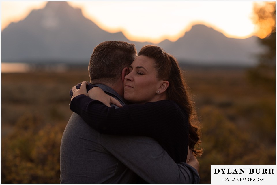 grand teton wedding anniversary photos hug him like you are leaving for 2 years