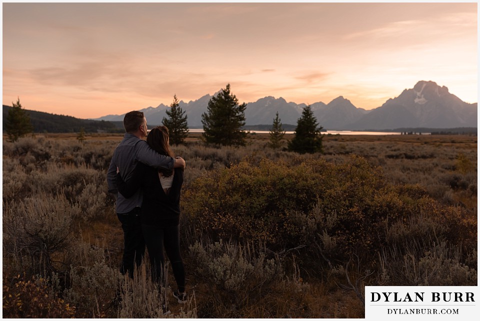 grand teton wedding anniversary photos final sunset view of grand teton mountains at sunset with couple