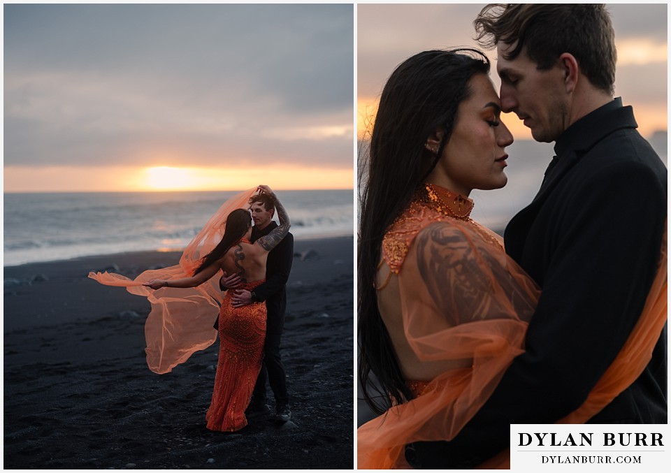 iceland elopement at reynisfjara beach orange dress cuddling close in the wind