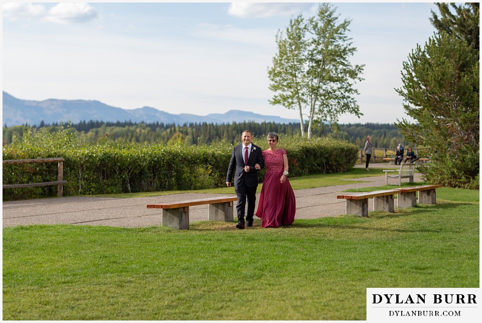 jackson lake lodge wedding grand tetons wyoming mother of bride walking to ceremony site