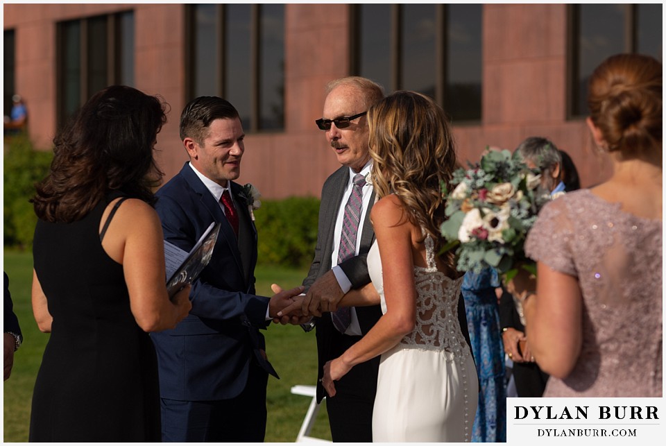 jackson lake lodge wedding grand tetons wyoming father handing over bride