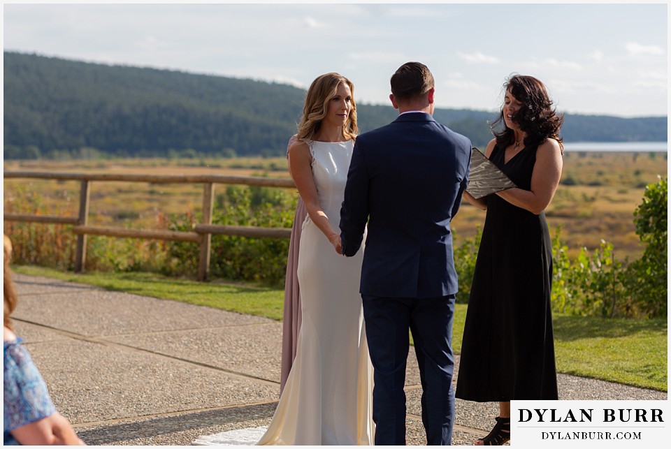 jackson lake lodge wedding grand tetons wyoming bride looking at groom