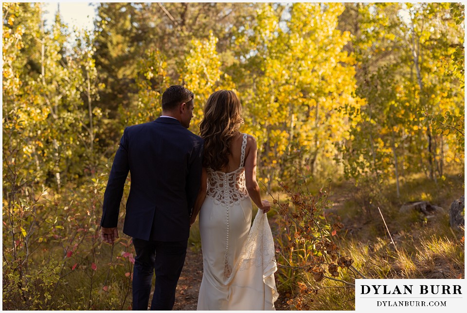 jackson lake lodge wedding grand tetons wyoming brides dress details in fall foliage