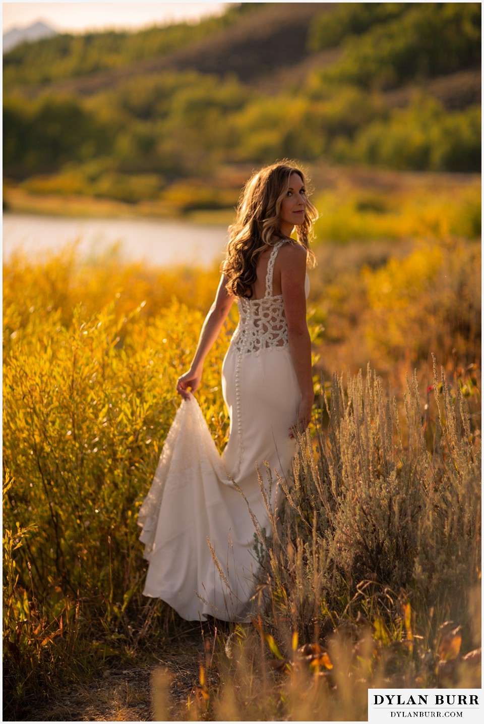 jackson lake lodge wedding grand tetons wyoming gorgeous bride looking back at groom