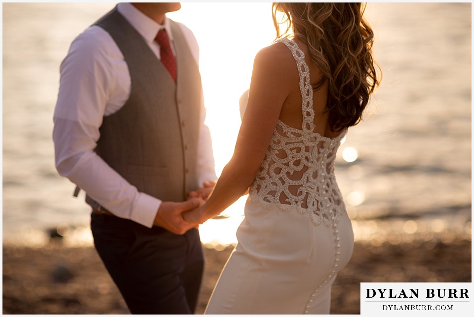 jackson lake lodge wedding grand tetons wyoming close up of brides details with sunset glow