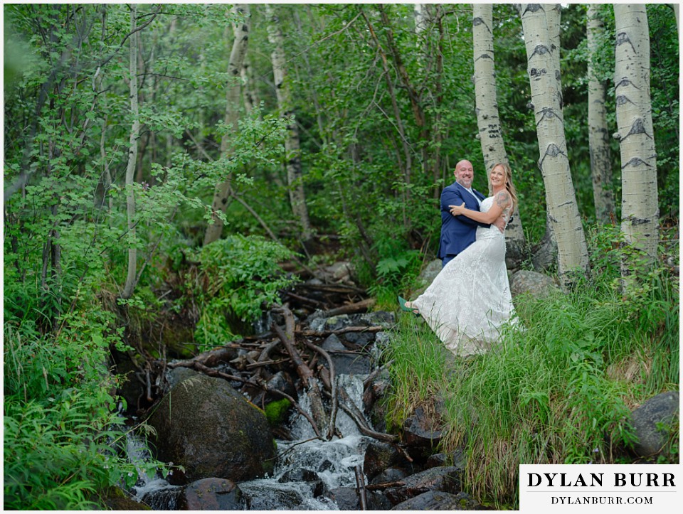 knoll willows open space elopement wedding having fun together near waterfall