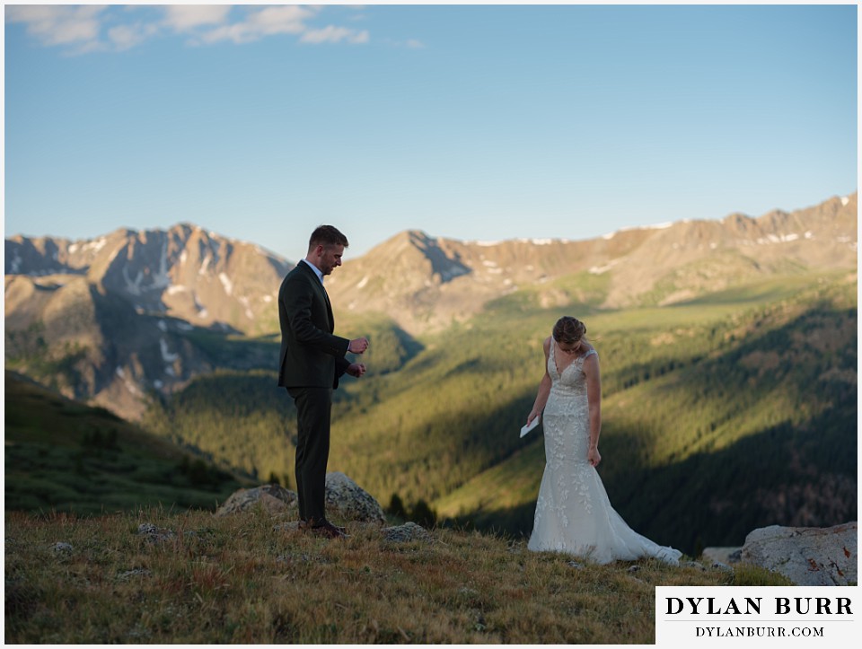 sunrise elopement wedding bride and groom exchanging vows