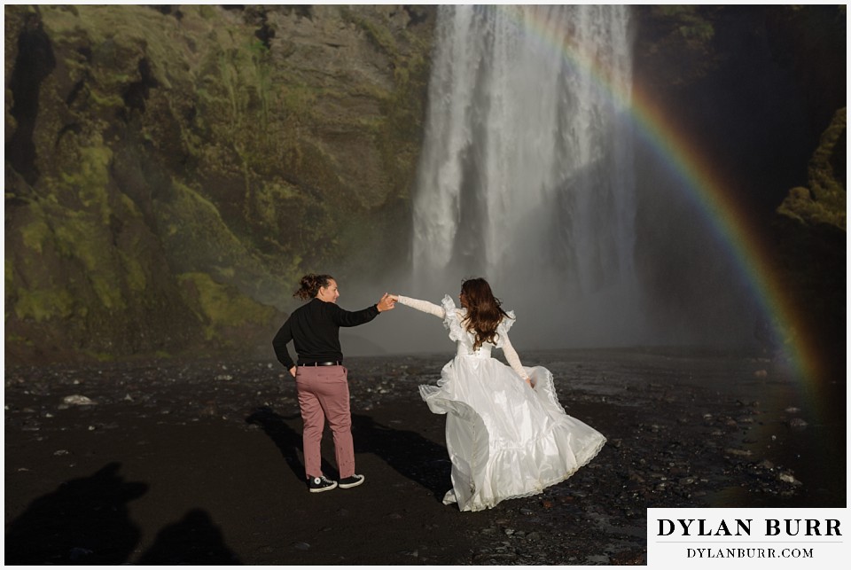 lgtbq iceland elopement wedding Skogfoss with a rainbow