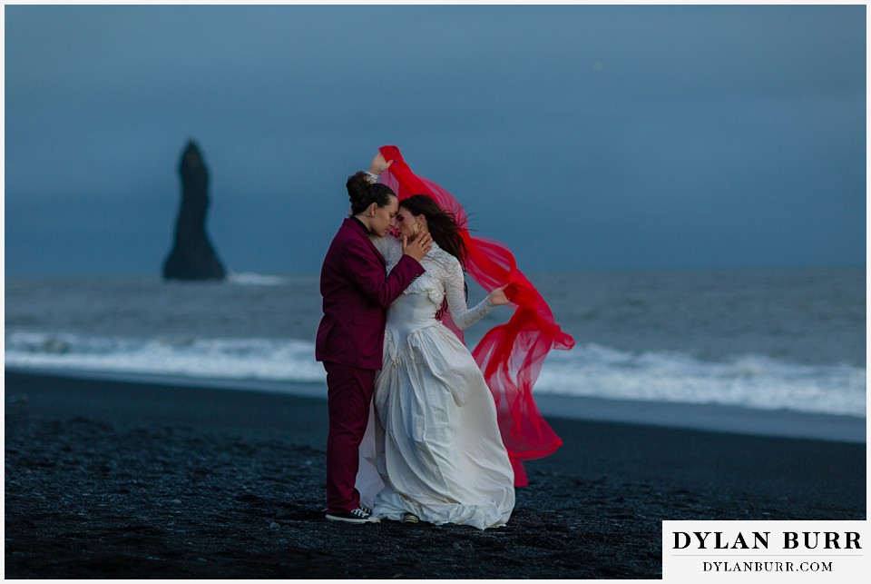 lgtbq iceland elopement wedding Reynisfjara beach Reynisdrangar in the distance